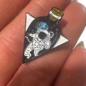 BOTTLED ASTRONAUT Enamel Pin